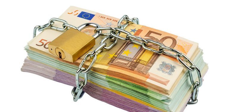 A stack of cash that needs to be unlocked